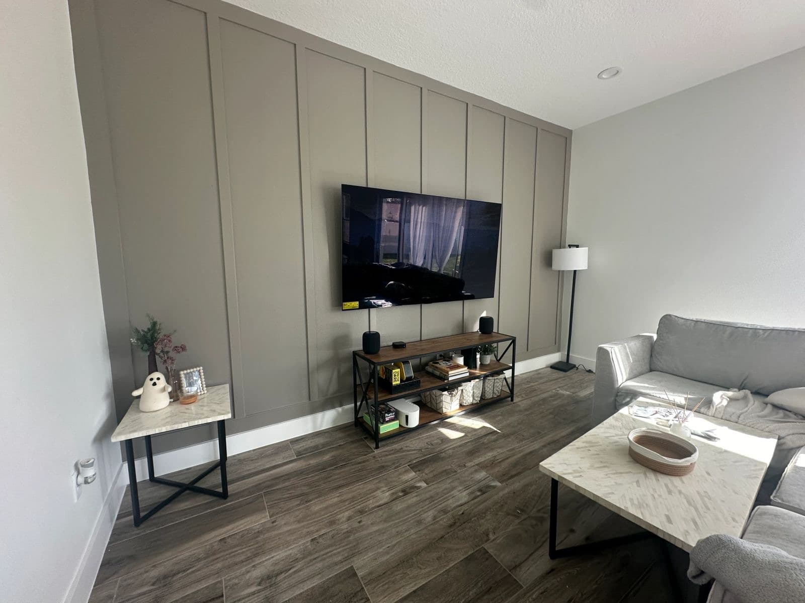 TV on a gray board-and-batten wall