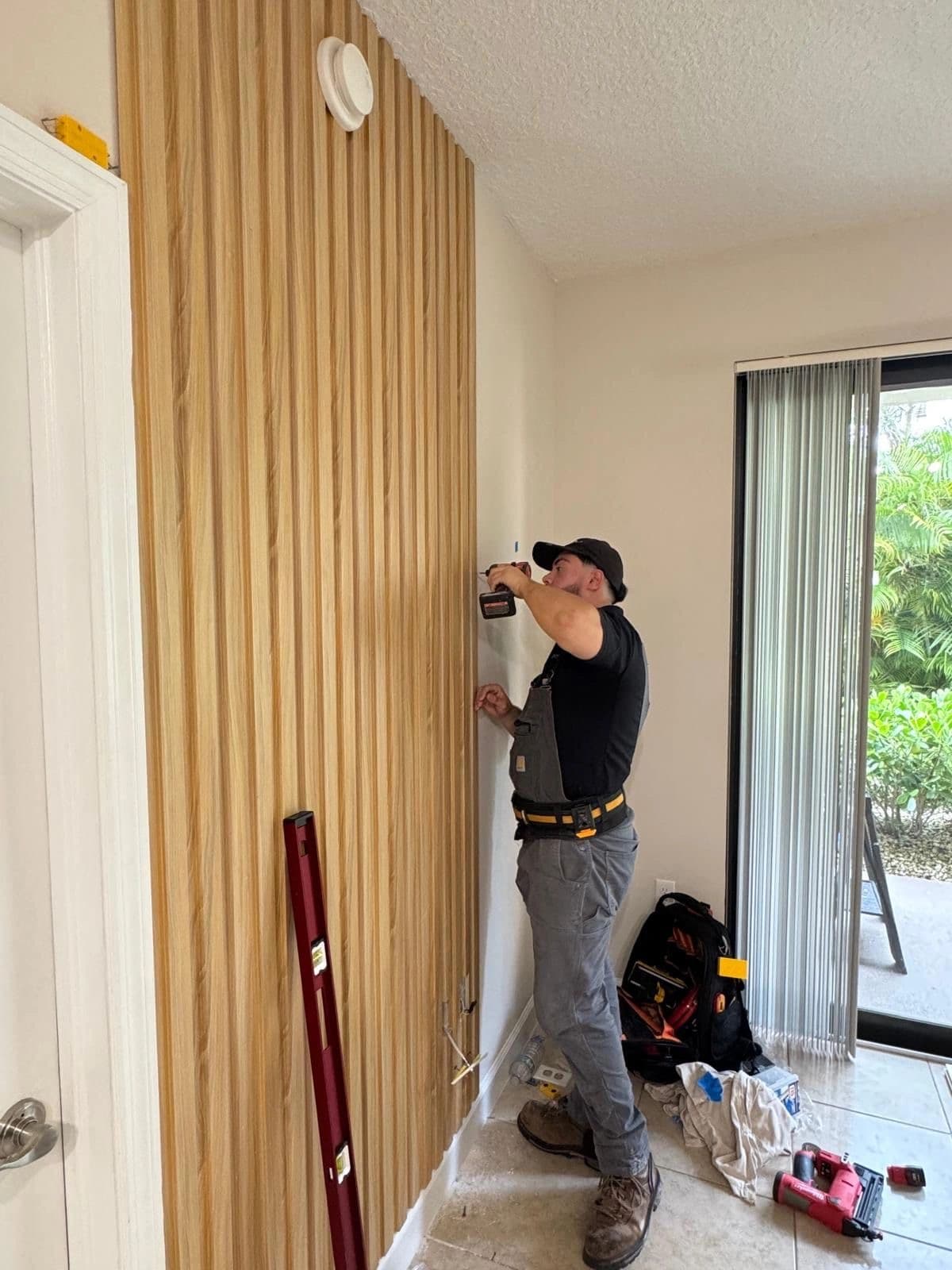 Mountzilla installer fitting slat wall panels